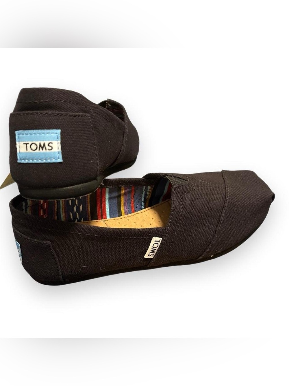 Toms women’s black Canvas Slip-On with Striped Insole